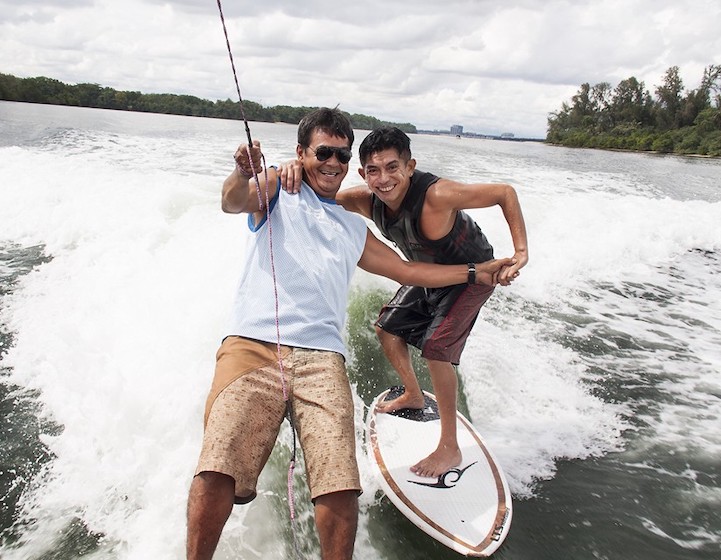 wakeboarding singapore ryders singapore two men wakeboarding