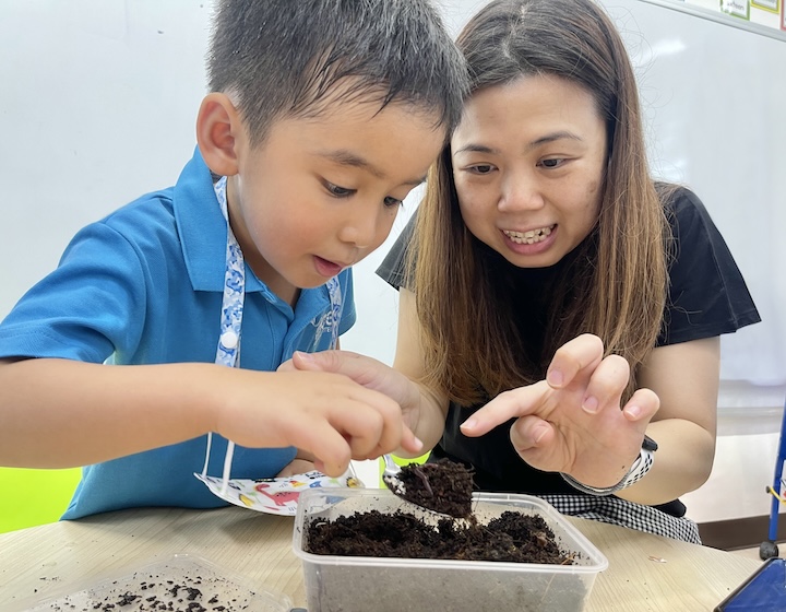 MOE Kindergarten @ Temasek - teacher and student