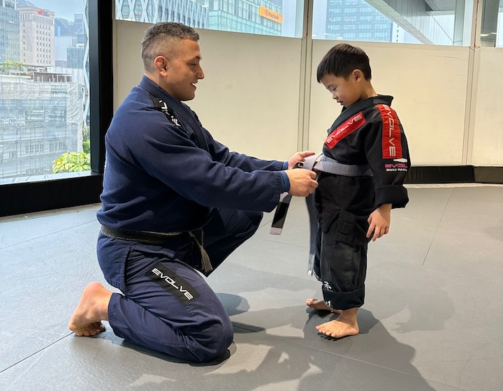 Evolve MMA - Coach and Student