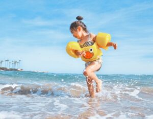 bepanthen's eczema range - happy kid on the beach