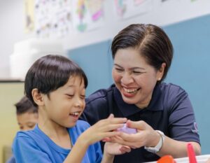 psle scoring system - moe singapore - teacher and student with special needs