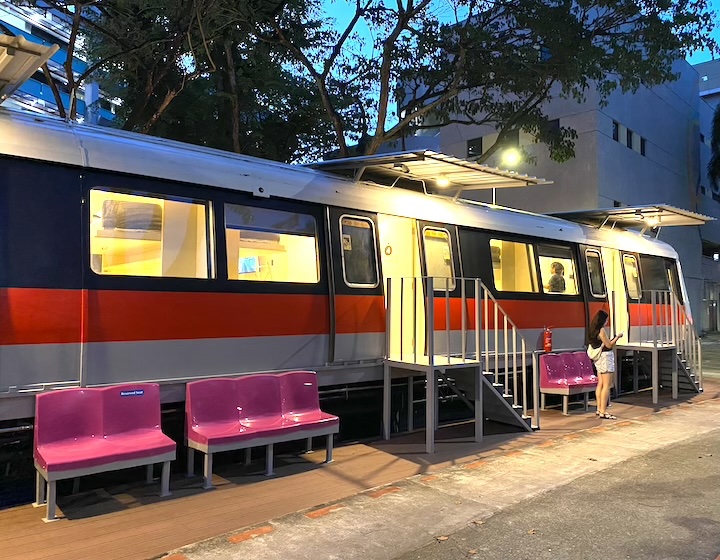 tiny pod train pod hotel - one-north - mrt seats exterior