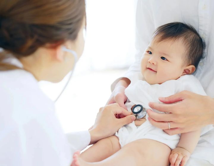 parkway medicentre singapore - doctor checking baby